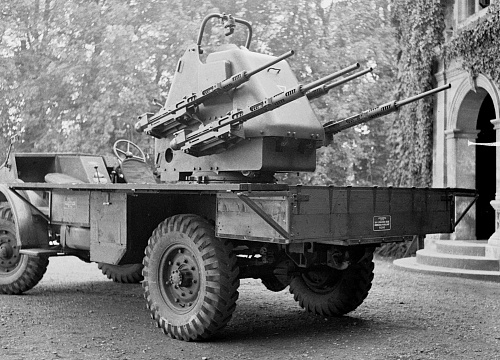 Click image for larger version

Name:	60f378bdb4cab17a4ee6d85b_Polsten-quad-AA-gun--mounted-on-a-CMP-truck--MIKAN-No--3607616.jpg
Views:	4
Size:	610.4 KB
ID:	133311