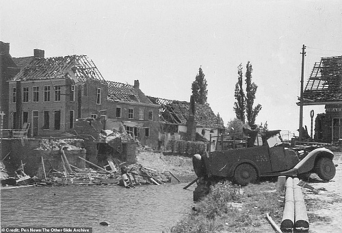 Click image for larger version

Name:	10035460-8337363-The_town_of_Dunkirk_itself_was_significantly_damaged_in_the_figh-a-16_158996806.jpg
Views:	2
Size:	154.9 KB
ID:	139134