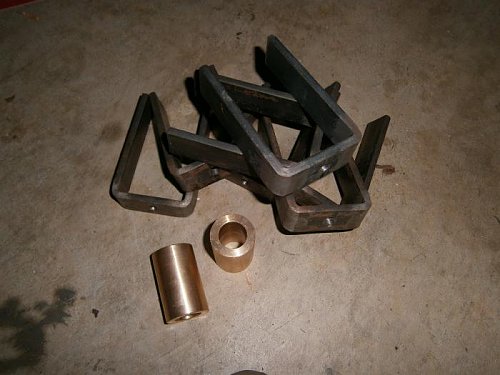 Click image for larger version

Name:	New front spring clamps & spring bushes.jpg
Views:	12
Size:	43.6 KB
ID:	60539
