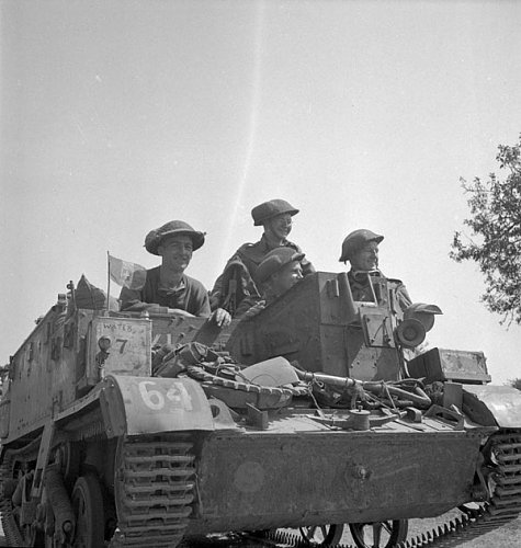 Toronto Scottish Regiment (M.G.) in a Universal Carrier near Tilly-la-Campagne, France, 8 August.jpg