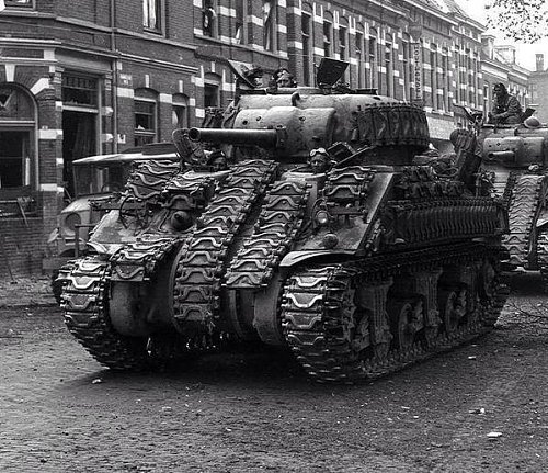 Click image for larger version

Name:	Sherman in Arnhem 1945.jpg
Views:	19
Size:	76.9 KB
ID:	72411