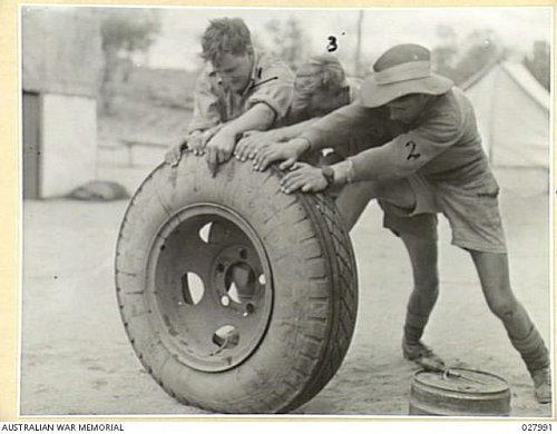 Click image for larger version

Name:	027991  ALICE SPRINGS, AUSTRALIA. 1942-12-08. MEMBERS OF THE 149TH AUSTRALIAN GENERAL TRANSPORT .jpg
Views:	5
Size:	38.7 KB
ID:	79253