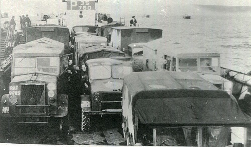 50s RAF trucks on a landing craft.jpg