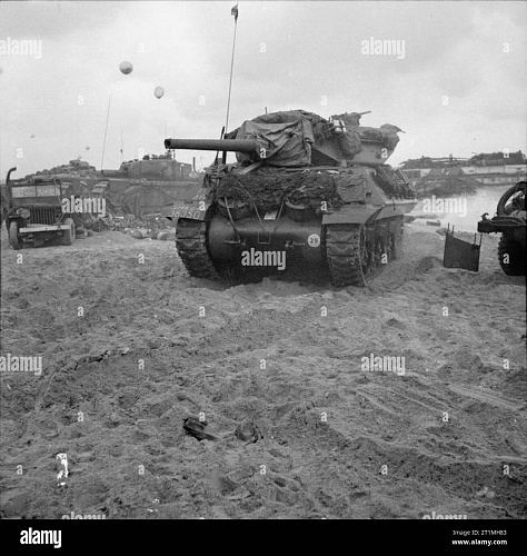 Click image for larger version

Name:	d-day-british-forces-during-the-invasion-of-normandy-6-june-1944-an-m10-wolverine-3-inch-self-pr.jpg
Views:	5
Size:	184.0 KB
ID:	136976