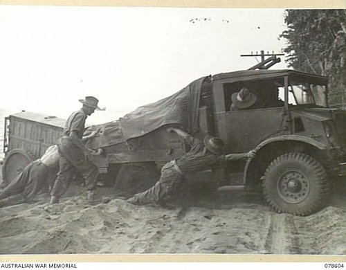Click image for larger version

Name:	078604  BOUGAINVILLE 1945-01-24.  HQ 7TH BRIGADE F15A BOGGED IN SAND ON BEACH ROAD. TOWING JAPAN.jpg
Views:	17
Size:	60.5 KB
ID:	66619