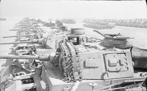 Armoured vehicles near El Alamein wait to be broken up for scrap metal, December 1943. E26958 IW.jpg