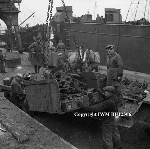 Scrap metal being loaded aboard ships at Antwerp docks for shipment to Great Britain Copyright I.jpg