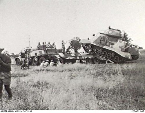 Click image for larger version

Name:	P01022.005  NARRABRI, NSW, 1942. Loading Grant M3 tanks for transport to Qld.  Owing to transpor.jpg
Views:	13
Size:	44.8 KB
ID:	67407