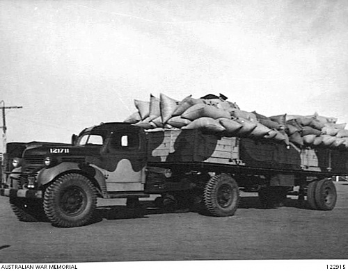 Click image for larger version

Name:	122915  ARN 121711 Dodge 7 ton semi trailer 3-tone camo BARMERA, SA 1944-05-16. HEADQUARTERS, LO.JPG
Views:	5
Size:	165.5 KB
ID:	94932