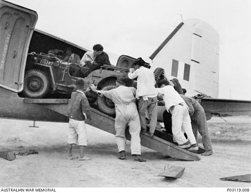 Click image for larger version

Name:	77-squadron-raaf-push-a-ford-model-gpw-jeep-onto-raaf-douglas-c-47-dakota-1950-p03119_008.jpg
Views:	7
Size:	39.4 KB
ID:	77019